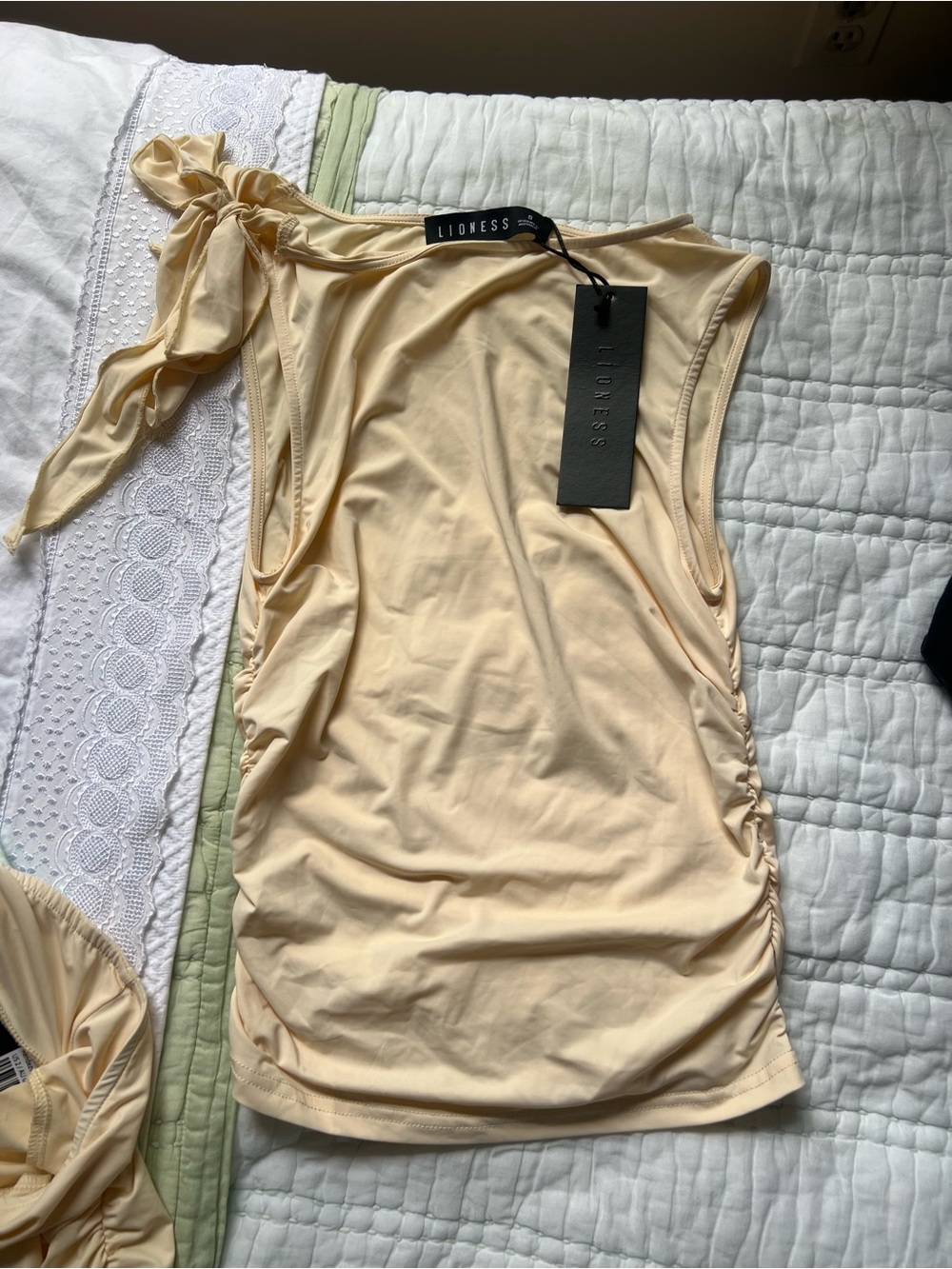 Lioness set -  top and skirt, pale canary. Brand new with tags.